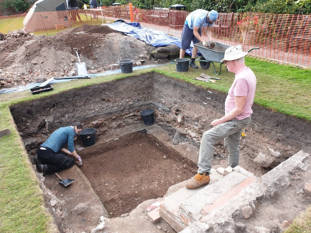 People continuing their Shrewsbury Castle dig trench