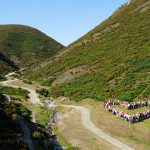 An image of people from Shropshire creating a heart formation in Carding Mill Valley in the heart of the Shropshire Hill Area of Outstanding Natural Beauty.