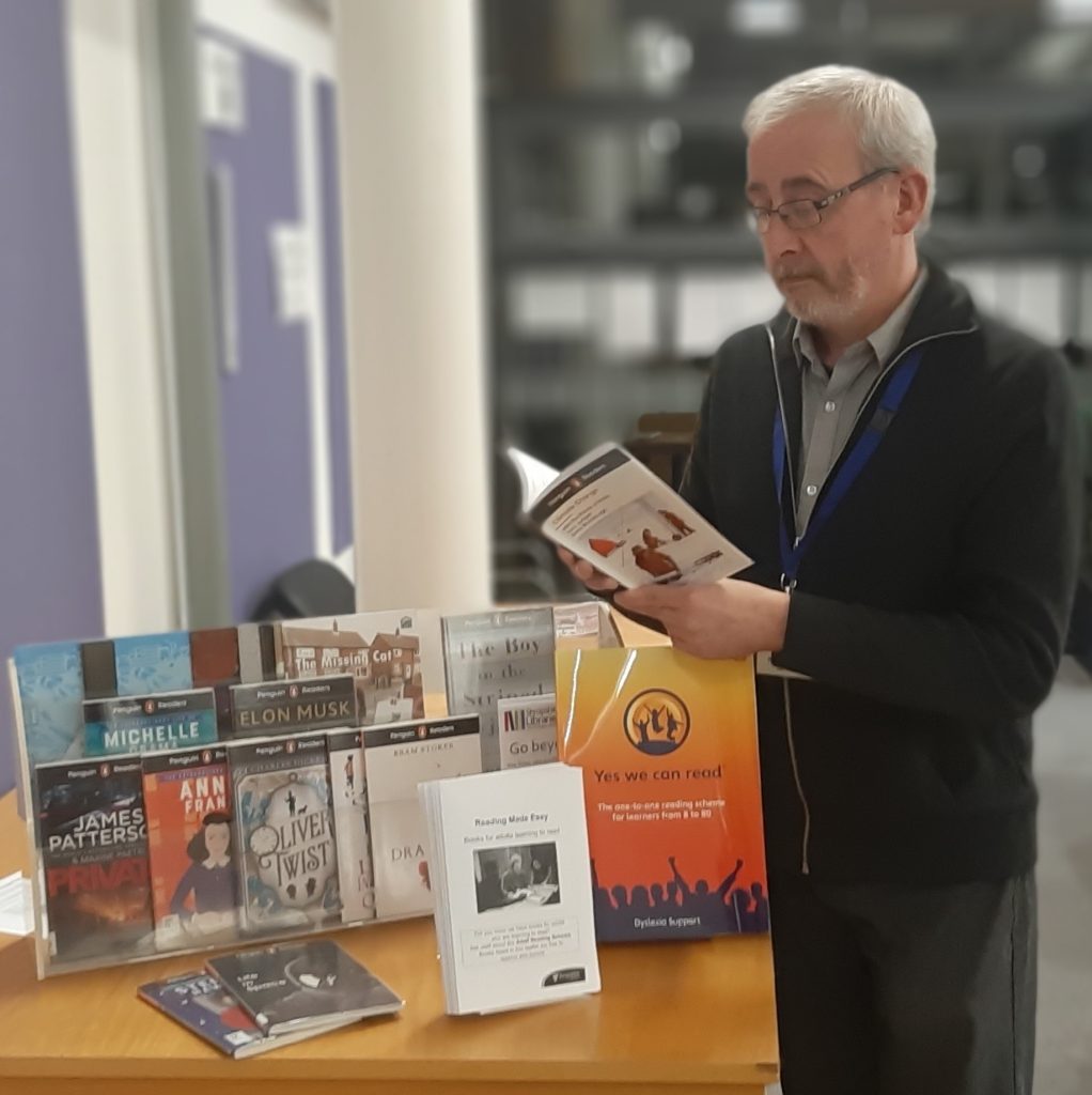 Iran Morris of Ludlow Library checking out the titles on offer