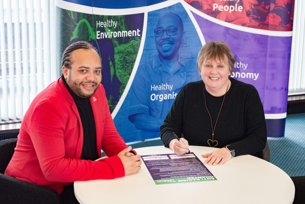 UNISON Anti-Racism Charter, signed by Ash Silverstone of UNISON (left) and Lezley Picton, Leader of Shropshire Council (right)