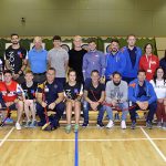 This is an image of Shropshire Armed Forces Covenant partners in a sports hall with Armed Forces veterans and coaches of the Battle Back Centre