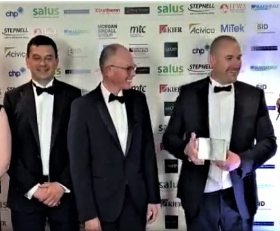 Winning team being presented with the award. Left to right Lucy Fletcher (Shropshire Council), Damien Bryan (Read Construction), Harvey Gould (Shropshire Council) and Alex Read (Read Construction)