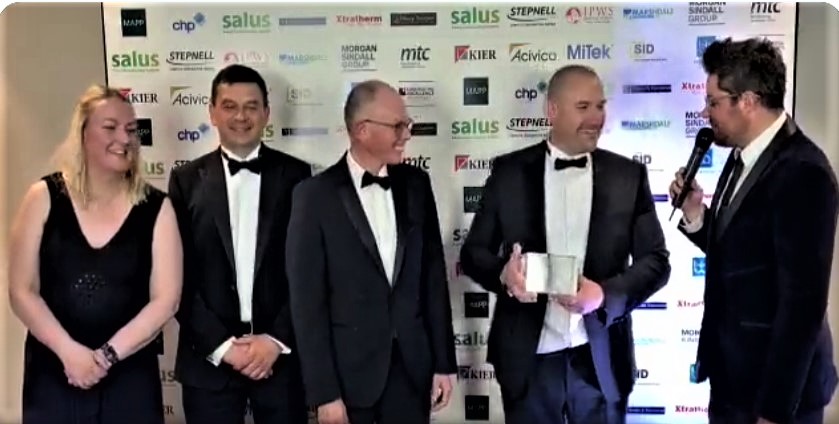 Winning team being presented with the award. Left to right Lucy Fletcher (Shropshire Council), Damien Bryan (Read Construction), Harvey Gould (Shropshire Council) and Alex Read (Read Construction) 