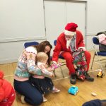 Charlotte Pryce and her daughter Eira enjoyed Santa’s visit after Shropshire Council mobile library driver Chris Wood saved the day