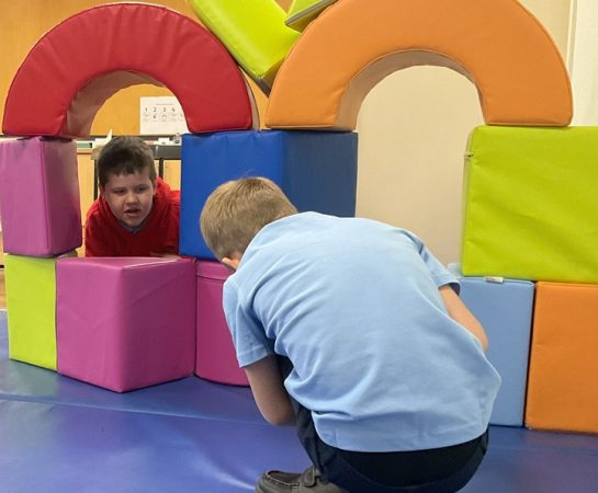 Two children at soft play