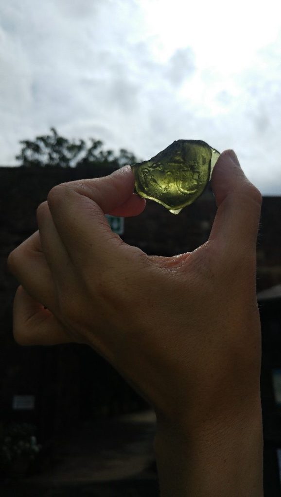 An image of the Corbet glass seal fragment found during the first ever excavation at Shrewsbury Castle.