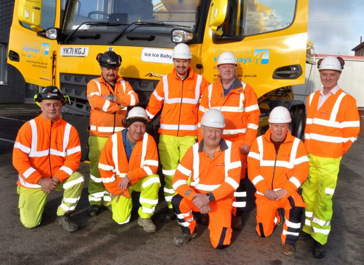 Councillor Dean Carroll with gritters drivers from the council's Whittington depot