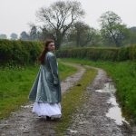 female character in a lane, from a Thomas Hardy novel