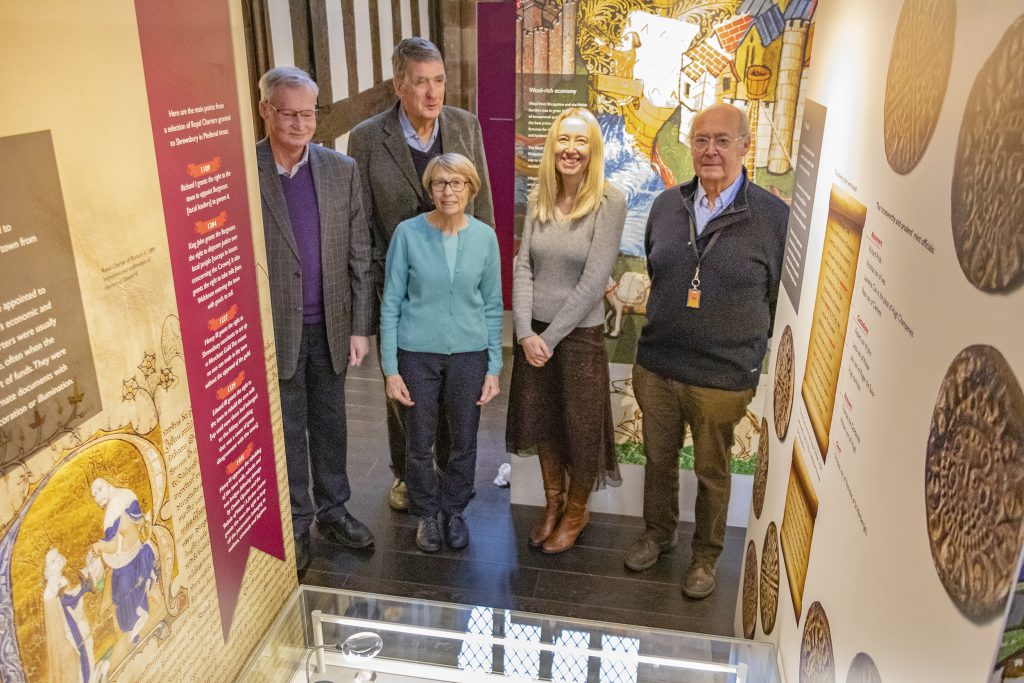 An image of the Friends of Shrewsbury Museum and Art Gallery with the museum manager at the handover of the rare gold angel.
