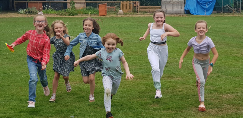 Children running - to celebrate HAF programme for summer 2022