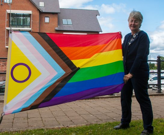 Leader of Council Heather Kidd with the Pride flag