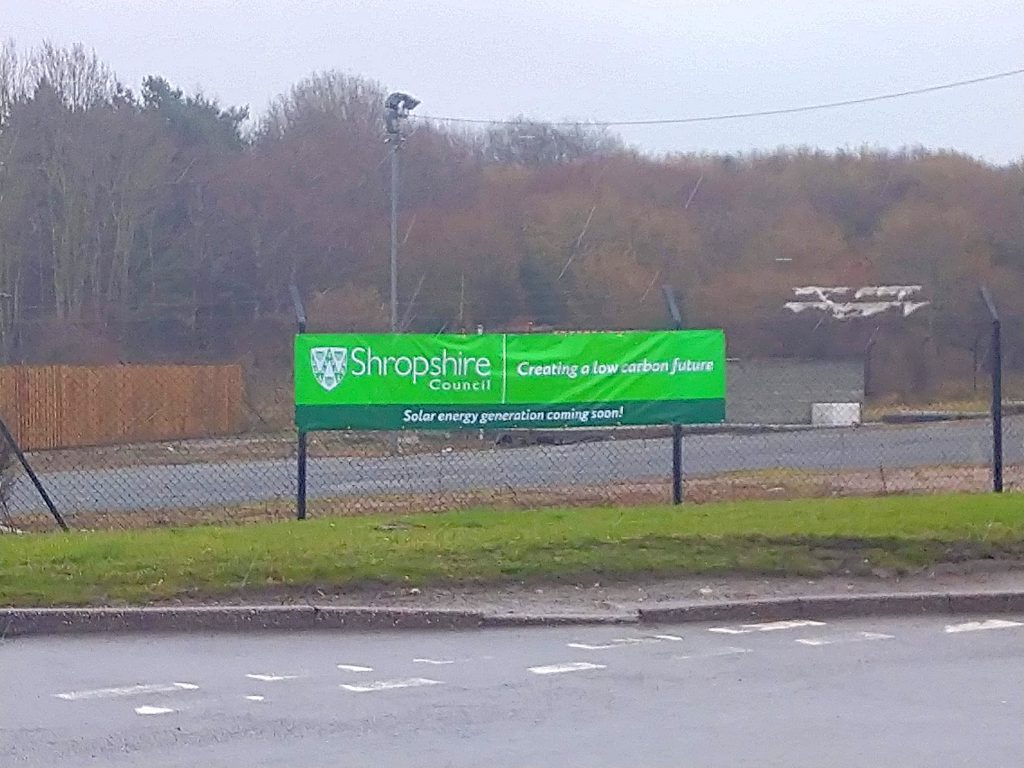 A banner at the solar array site in Oswestry