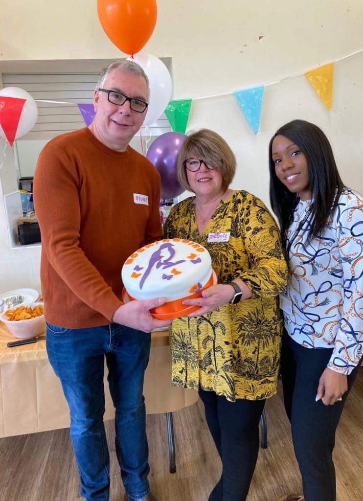 Foster carers Stuart Forrester and Jacquie Forrester with Sadé Liburd, Senior Practitioner and Mockingbird Liaison Worker at Staffordshire County Council