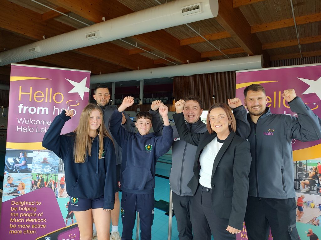 Staff from Halo are joined by the headteacher and pupils from William Brookes School to celebrate day one of the new partnership