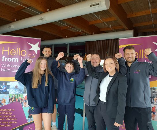 Staff from Halo are joined by the headteacher and pupils from William Brookes School to celebrate day one of the new partnership