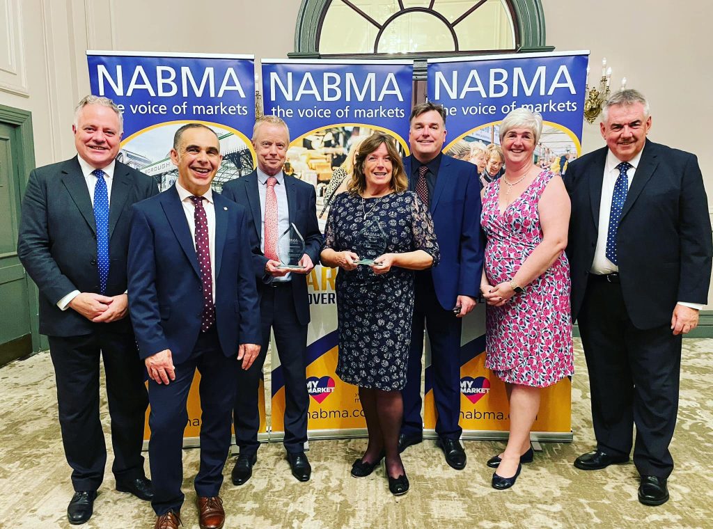 left to right: Simon Baynes (Parliamentary Candidate for North Shropshire), Arren Roberts (Town Clerk), Roger Dyke (Finance Officer), Councillor Olly Rose (Mayor of Oswestry), David Clough (Events & Markets Officer), Katherine Brown (Blachere Illumination UK) and David Preston (CEO of NABMA).