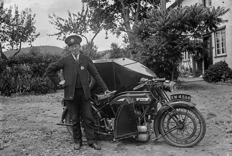 Postman in front of post office motorbike, c.1915-20, Shropshire Archives ref: PH/B/34/85/355