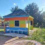 A brightly painted wooden hut