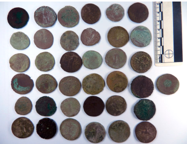 An image of the Roman coin hoard that was found in Whittington, Shropshire. It has been declared as treasure.