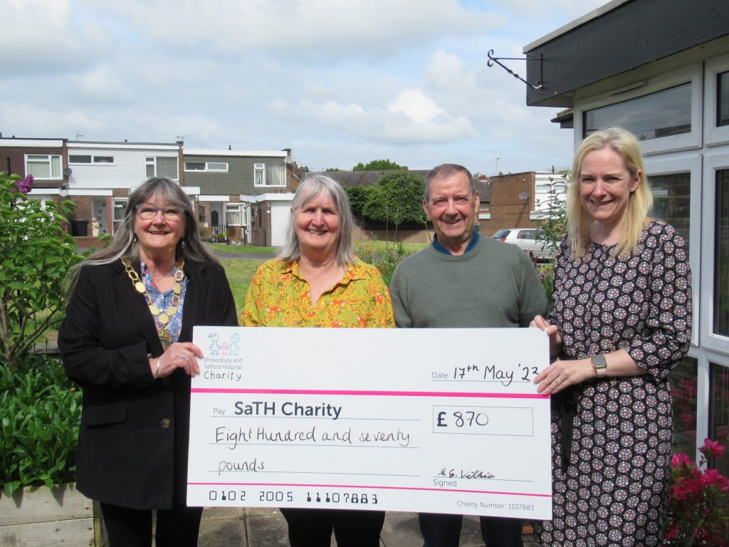 People and a SaTH charity donation