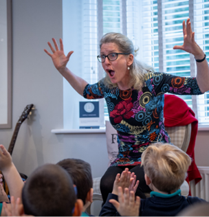 An image of Sal Tonge leading a session with school children