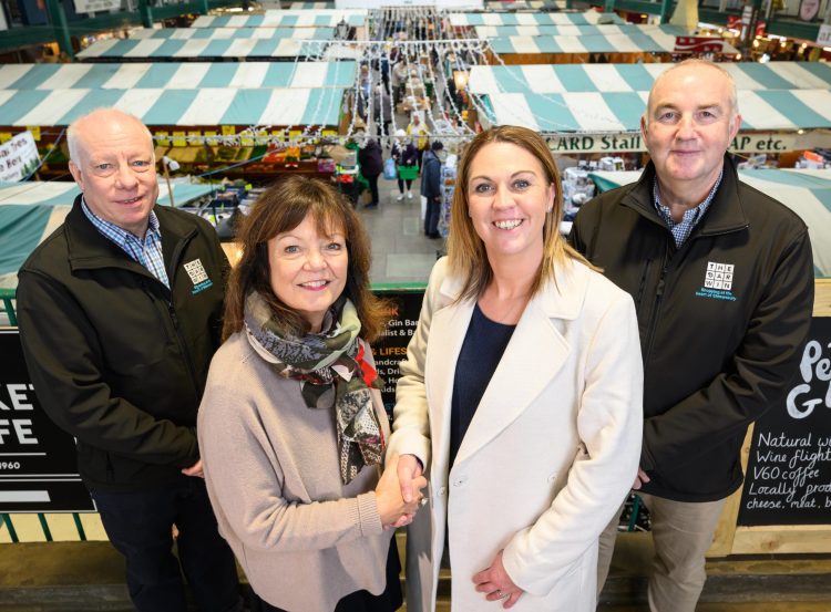 Kate Gittins (front left) hands over the management reins of Shrewsbury Market Hall to (from left) Russell Hall, Amy Williams and Kevin Lockwood.