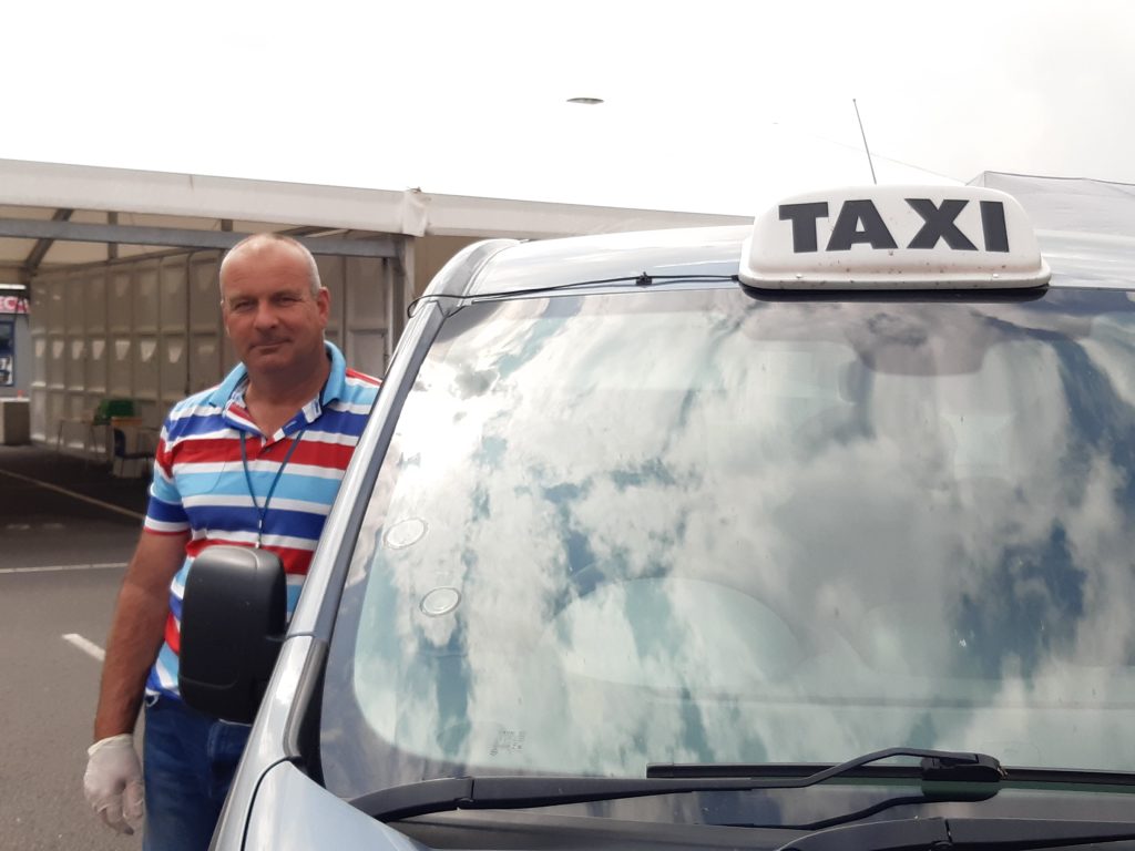 Simon Bendall and taxi at the Shrewsbury assessment centre
