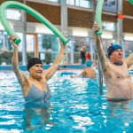 Image of two older people in swimming pool