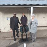 Connected Kerb ambassador Martin Offiah with Councillors Ian Nellins and Peggy Mullock at the Brownlow Street car park in Whitchurch