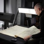An archivist doing a digitisation of Bishop's Castle charter