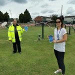 People at Craven Arms playground handing out information