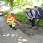 John Link from Kier explains the pothole repair process to councillors David Turner (centre) and Simon Harris (right)