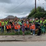 People with litterpicking equipment