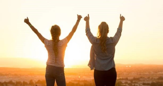 2 people being happy - World Mental Health Day