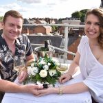 couple getting engaged on Market Hall roof