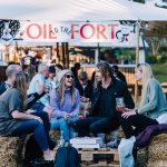 People sitting drinking, at Oil to the Fort at Shrewsbury Castle in 2021. Photo: Birgitta Zoutman