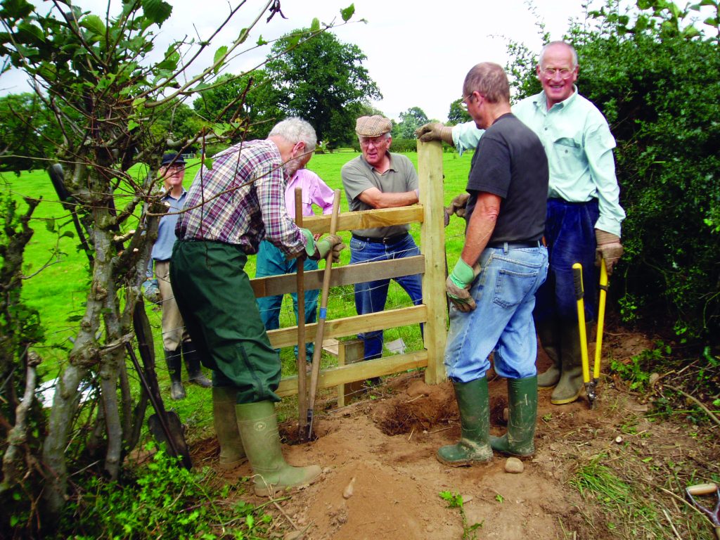 An image of Outdoor Partnerships volunteers installing a new stile on Shropshire's right of way.