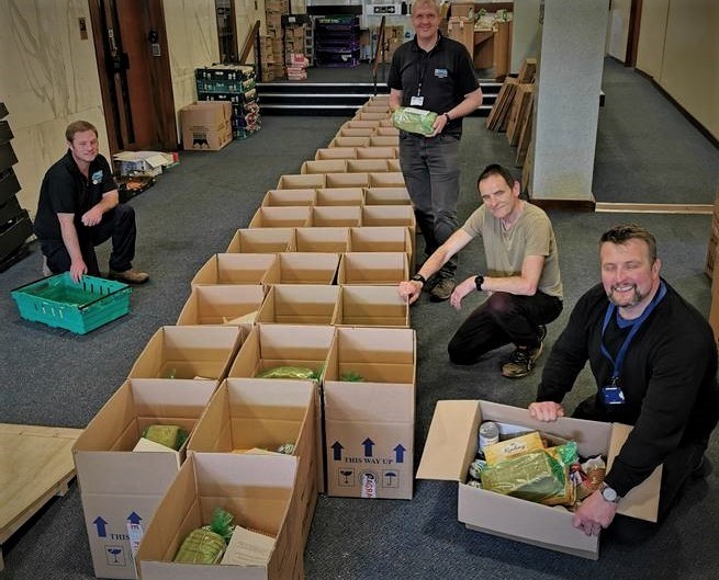 Food parcels being readied for taking to homes of the most vulnerable. Pete Banford is furthest to the right of the photo.