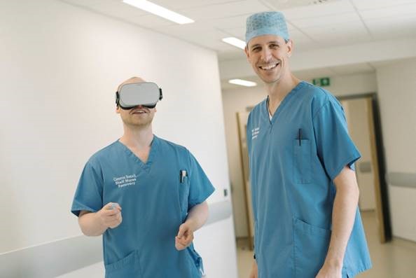 From left, Cameron Bostock and Paul Baker, Recovery Nurses, trying out the video glasses