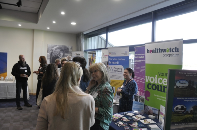 people standing chatting at VCSA annual assembly 2023