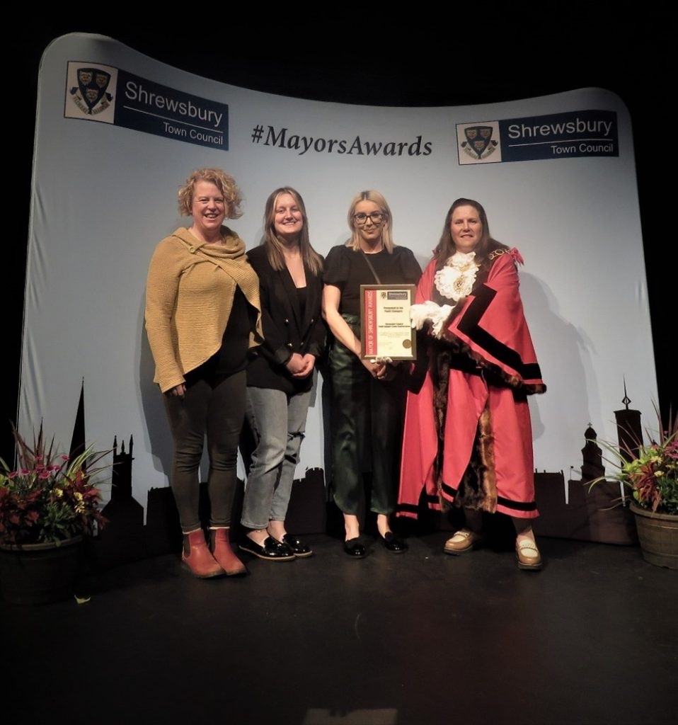 youth support team members being given an award